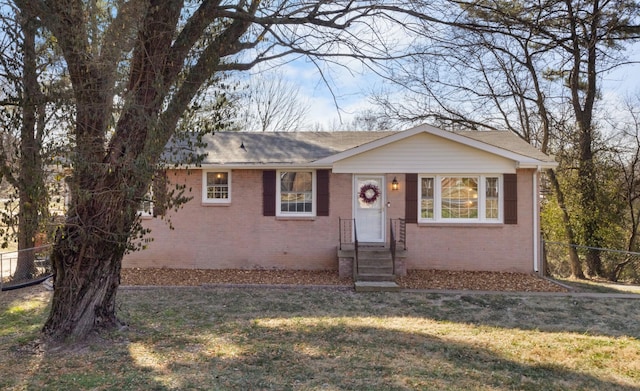 view of front of house with a front lawn