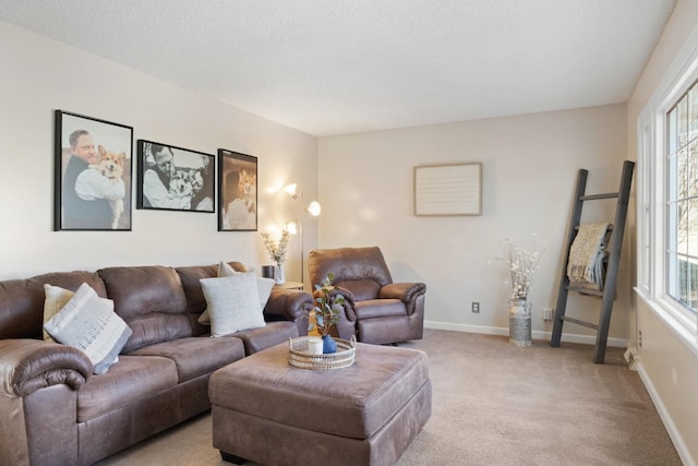 living room with light carpet and a textured ceiling