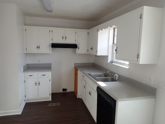 kitchen with sink, white cabinets, dark wood-type flooring, and black dishwasher