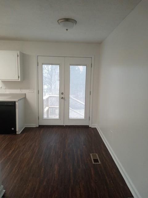 doorway featuring french doors and dark hardwood / wood-style floors