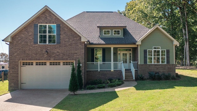 craftsman house featuring a garage, covered porch, and a front yard