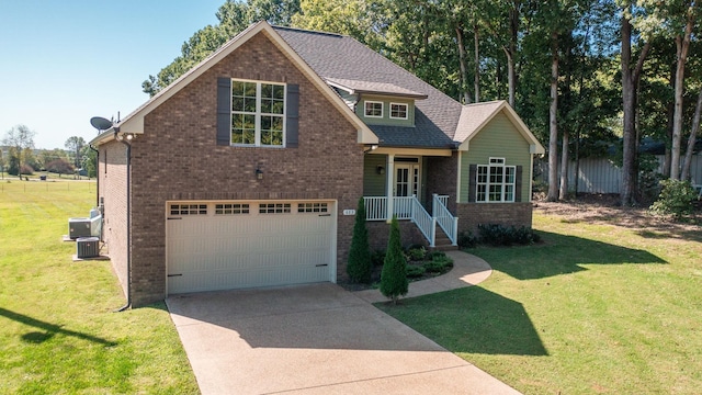 view of front facade featuring central AC unit, a front yard, and a garage