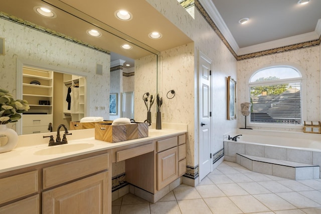 bathroom with vanity, tiled bath, tile patterned floors, and crown molding