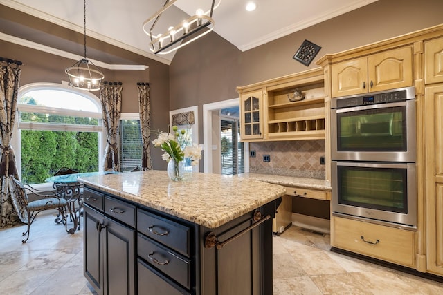 kitchen featuring hanging light fixtures, light stone counters, double oven, decorative backsplash, and ornamental molding