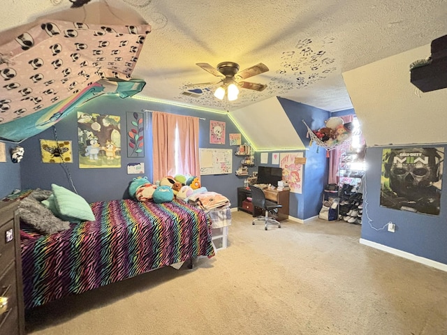 carpeted bedroom with ceiling fan, a textured ceiling, and vaulted ceiling