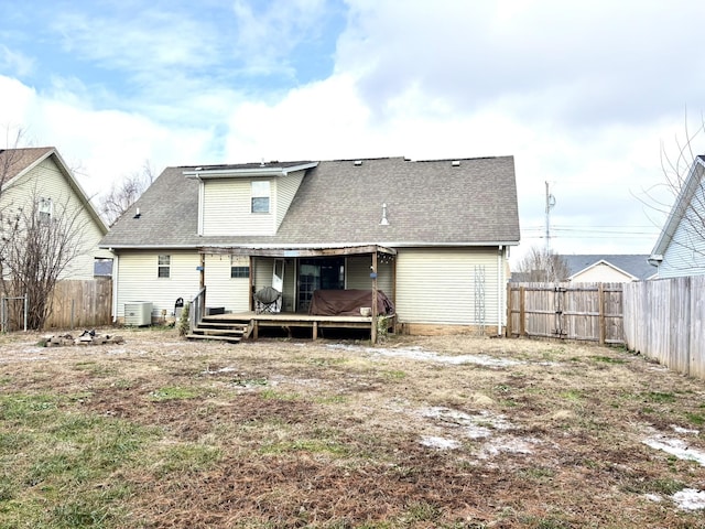 back of property with central air condition unit and a wooden deck