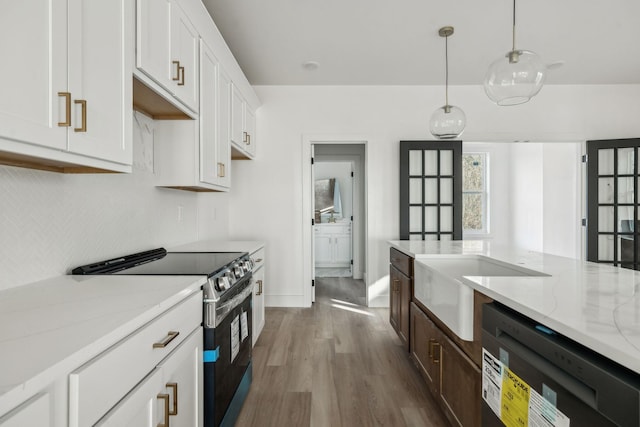 kitchen featuring electric range, dishwasher, light stone countertops, hanging light fixtures, and white cabinets