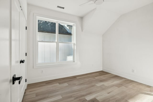 bonus room with ceiling fan, light hardwood / wood-style flooring, and lofted ceiling