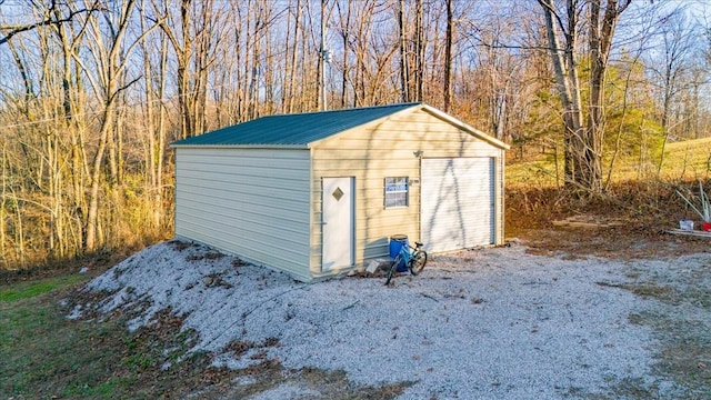 view of outdoor structure with a garage