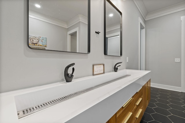 bathroom featuring vanity and crown molding