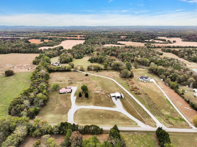 birds eye view of property featuring a rural view