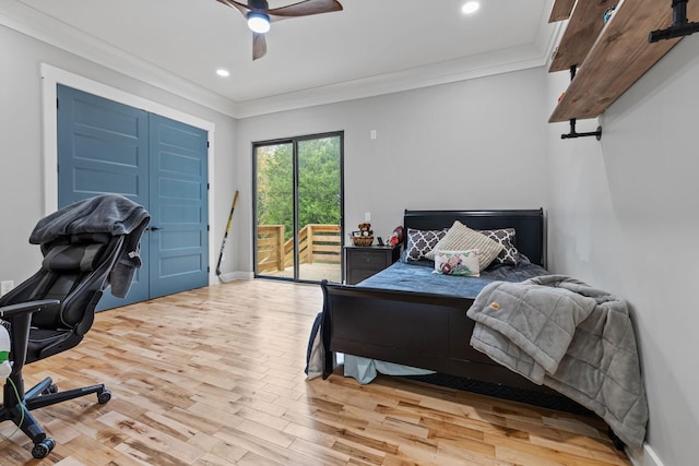 bedroom featuring hardwood / wood-style flooring, ceiling fan, crown molding, and access to outside