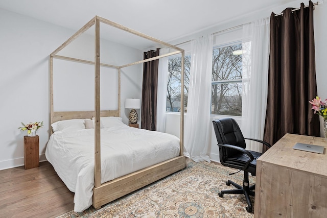 bedroom featuring hardwood / wood-style floors