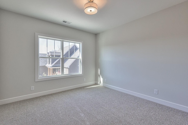 empty room with carpet floors