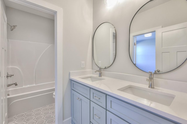 full bathroom featuring vanity, toilet, and bathtub / shower combination