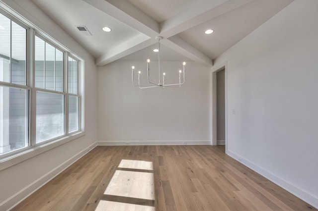 unfurnished dining area with lofted ceiling with beams, light hardwood / wood-style flooring, and an inviting chandelier