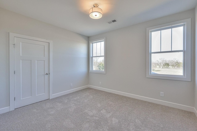 view of carpeted spare room