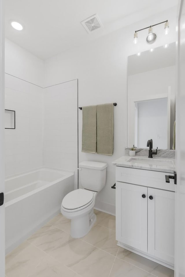 full bathroom featuring vanity, toilet, and bathtub / shower combination