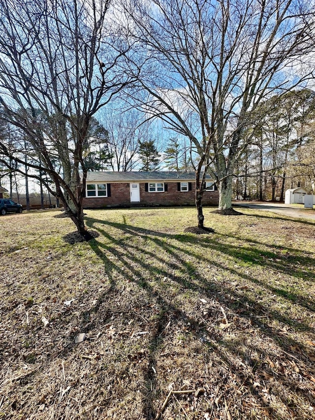 exterior space with a front lawn