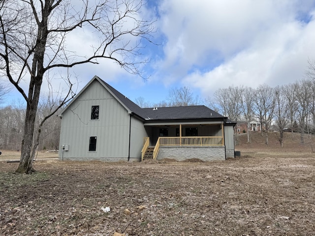 view of outbuilding featuring a porch