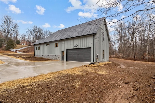 view of property exterior featuring a garage