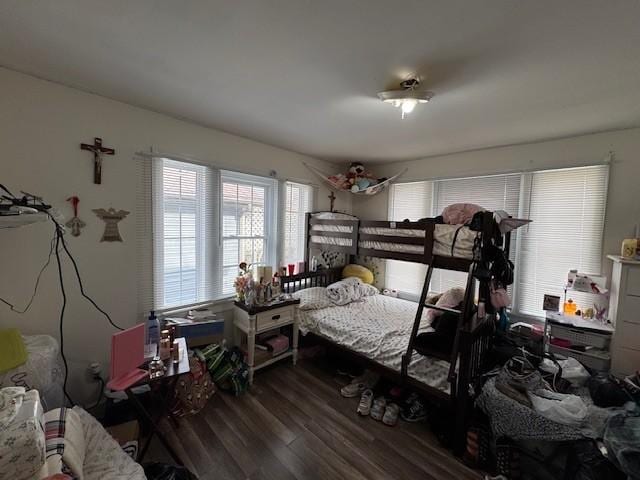 bedroom with hardwood / wood-style floors