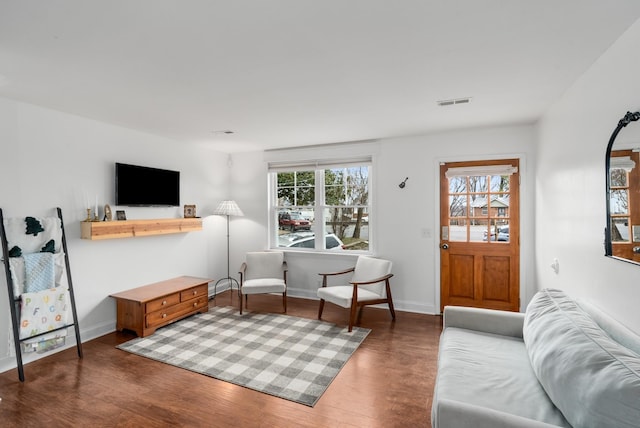 living room featuring dark hardwood / wood-style floors