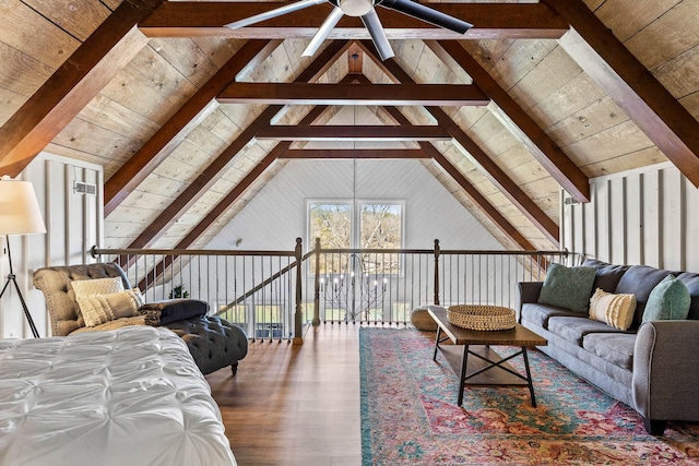 living room featuring lofted ceiling with beams, hardwood / wood-style flooring, ceiling fan, and wood ceiling