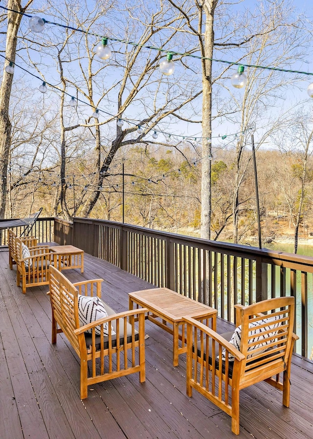 wooden deck featuring an outdoor hangout area