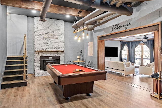 game room featuring ceiling fan, wood-type flooring, and billiards