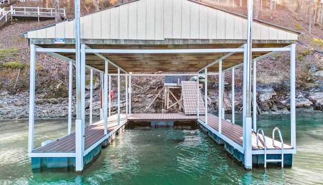 dock area with a water view