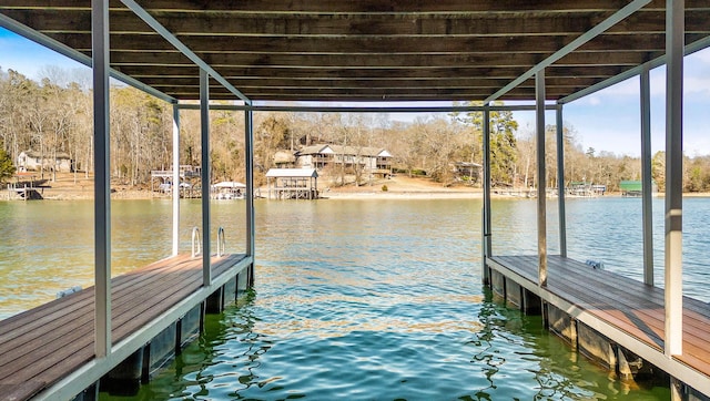 dock area featuring a water view