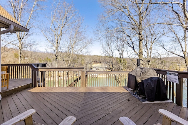 deck featuring a water view