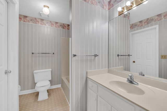 full bathroom with shower / bathing tub combination, vanity, and toilet