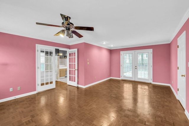 empty room featuring dark parquet flooring, ceiling fan, french doors, and crown molding