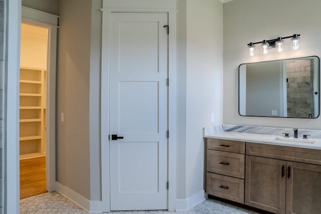 bathroom featuring tile patterned floors and vanity