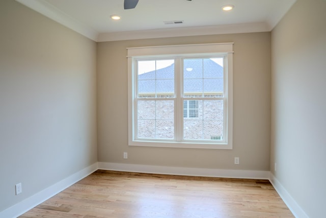 unfurnished room with light wood-type flooring, ceiling fan, and crown molding