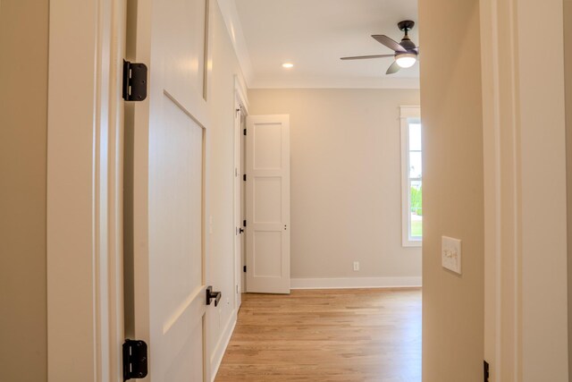 corridor featuring light hardwood / wood-style flooring