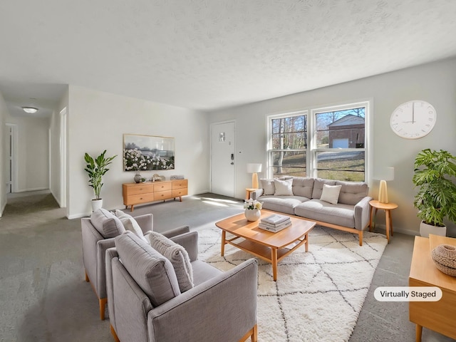 living room featuring a textured ceiling