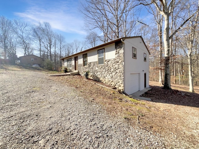 view of home's exterior featuring a garage