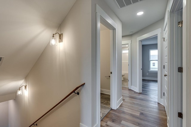 corridor with light wood-type flooring