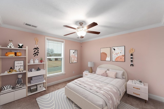 carpeted bedroom featuring crown molding and ceiling fan