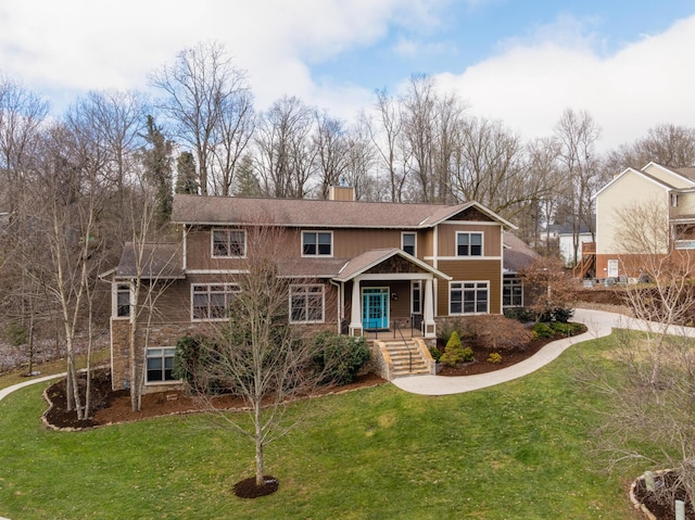 view of front of property featuring a front yard