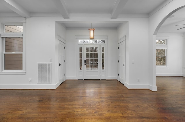 entryway with beam ceiling, ceiling fan, and dark hardwood / wood-style floors