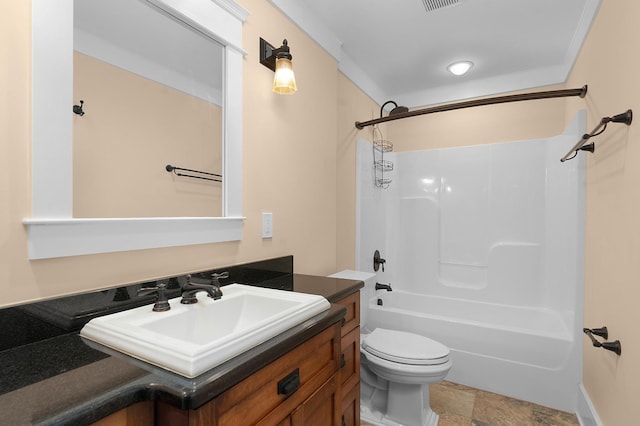 full bathroom with vanity, bathing tub / shower combination, toilet, and ornamental molding