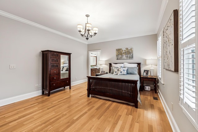 bedroom with light wood-type flooring, crown molding, and a notable chandelier