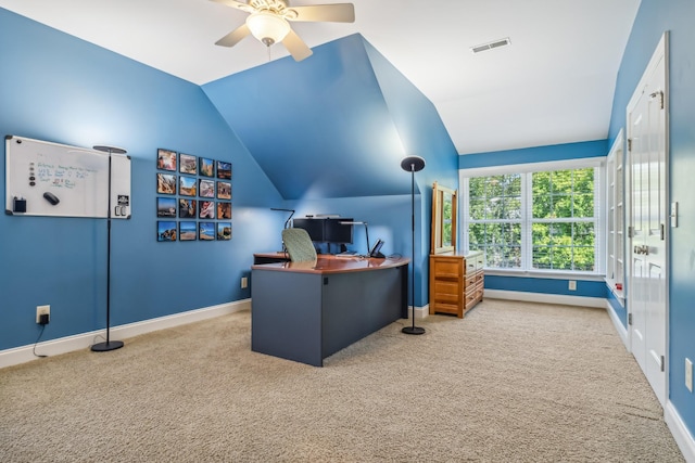 office space featuring carpet, ceiling fan, and lofted ceiling