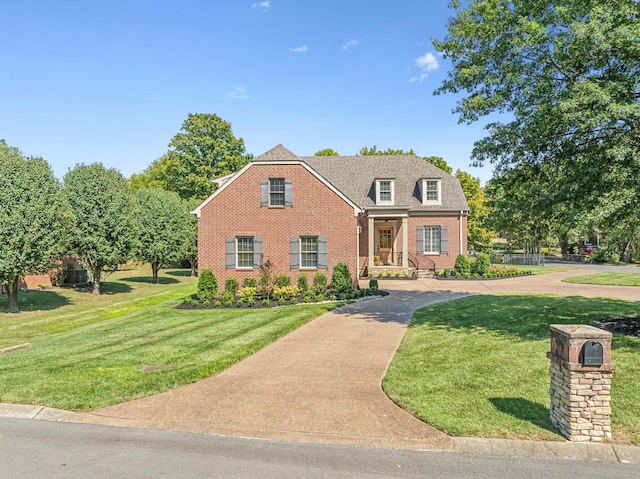 view of front of home with a front yard