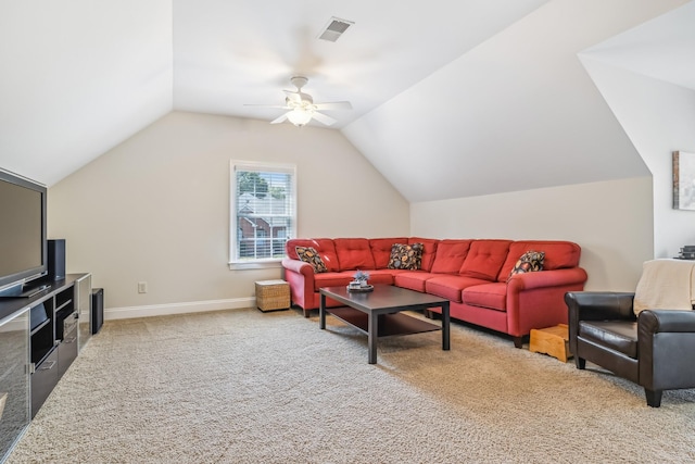 carpeted living room featuring ceiling fan and lofted ceiling