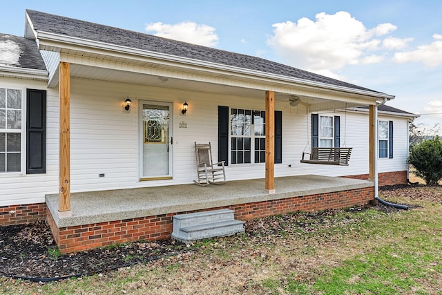 exterior space featuring ceiling fan and covered porch